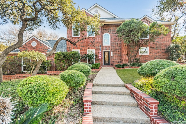 view of front of house with brick siding