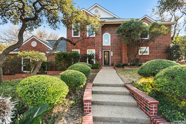 view of front of property featuring brick siding