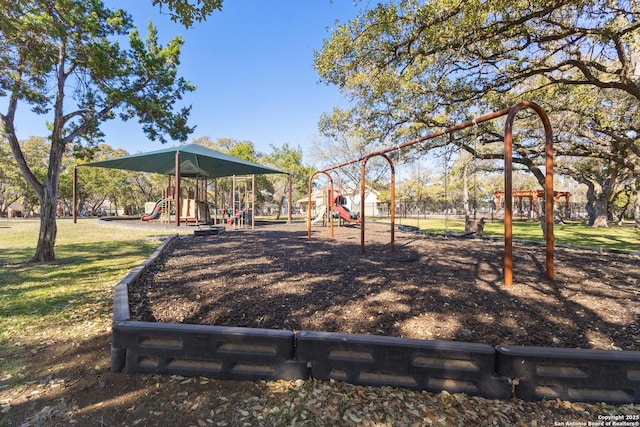 community playground featuring a yard