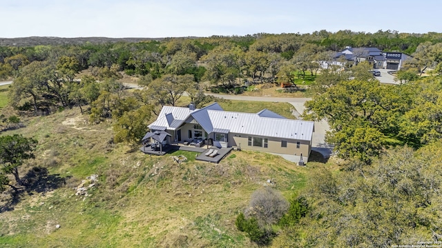 aerial view featuring a forest view