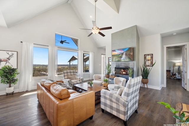 living room featuring a tiled fireplace, baseboards, and dark wood-style flooring