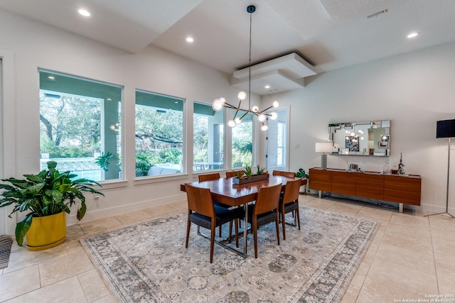 tiled dining area featuring a chandelier, recessed lighting, and baseboards