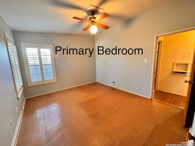 empty room with tile patterned floors, baseboards, and ceiling fan