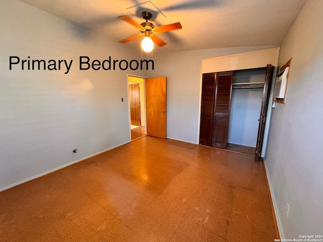 unfurnished bedroom with tile patterned floors, a closet, baseboards, and a ceiling fan