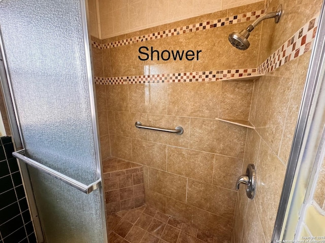 full bathroom featuring a shower stall