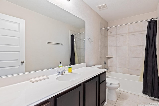 bathroom with visible vents, shower / bath combo with shower curtain, toilet, tile patterned flooring, and vanity