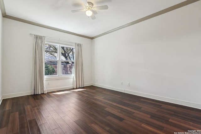empty room with a ceiling fan, dark wood-style floors, baseboards, and ornamental molding