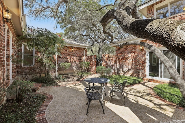 view of patio with fence
