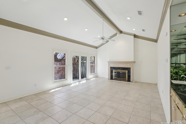 unfurnished living room featuring vaulted ceiling with beams, crown molding, a premium fireplace, light tile patterned flooring, and a sink