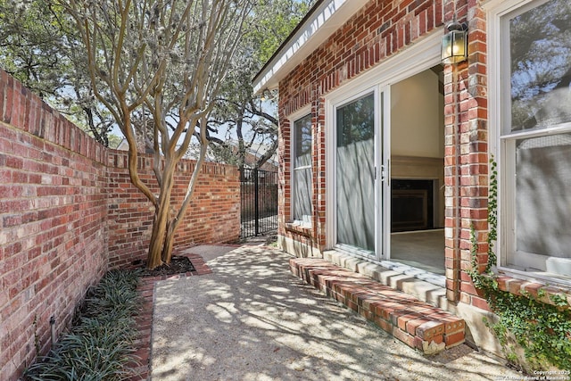 view of patio featuring fence