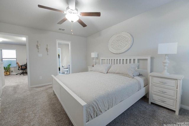 bedroom featuring visible vents, light colored carpet, baseboards, and ceiling fan