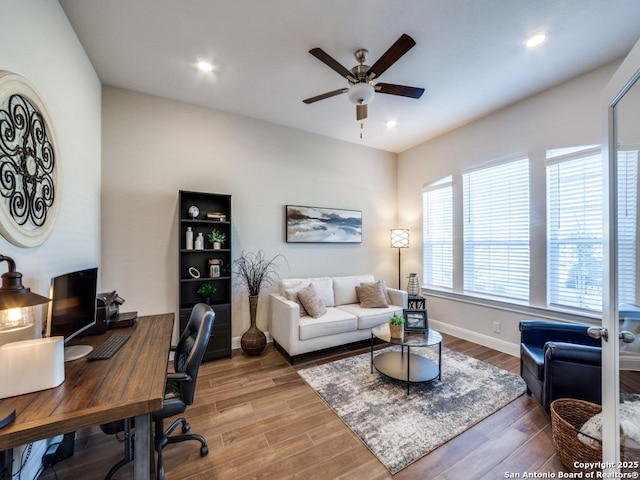 office with recessed lighting, baseboards, wood finished floors, and a ceiling fan