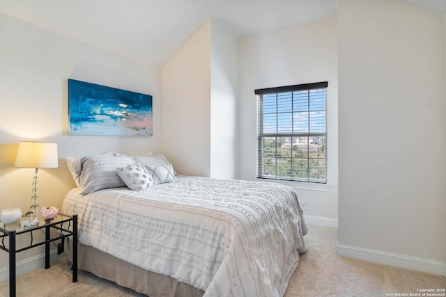 carpeted bedroom with baseboards