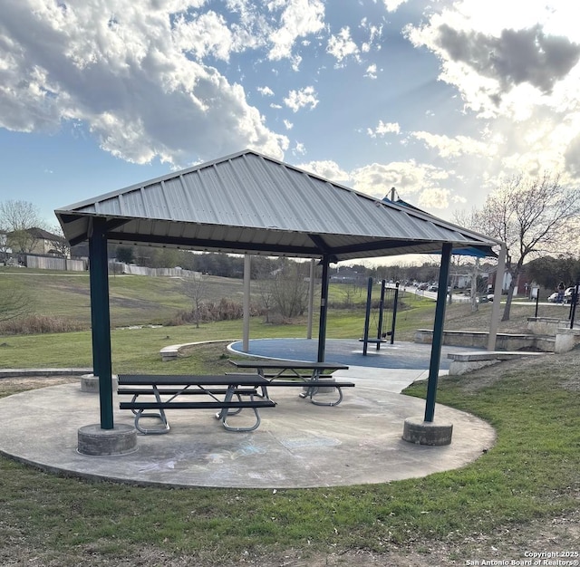 view of home's community with a gazebo and a lawn