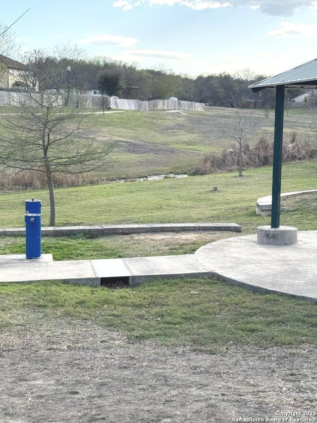 view of home's community featuring a lawn