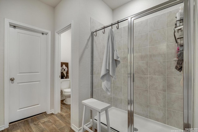 6424 Embankment, San Antonio, TX 78252 - full bath with toilet, wood finished floors, and a shower stall