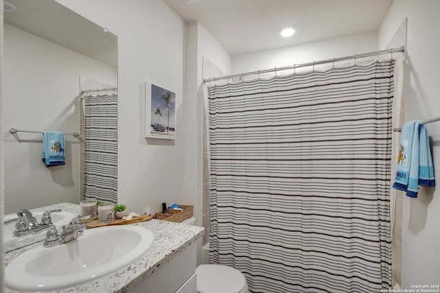 6424 Embankment, San Antonio, TX 78252 - full bath with vanity, a shower with shower curtain, and toilet