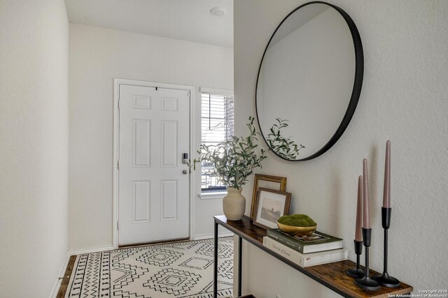 6424 Embankment, San Antonio, TX 78252 - foyer entrance featuring a healthy amount of sunlight and baseboards