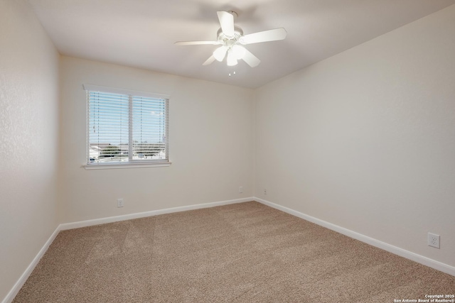 unfurnished room featuring baseboards, carpet, and ceiling fan