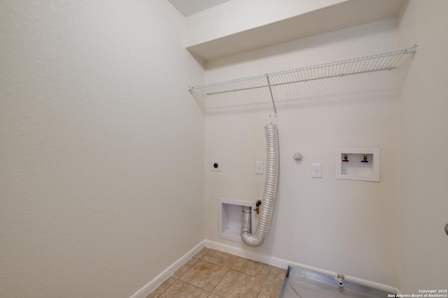 clothes washing area featuring hookup for a gas dryer, light tile patterned floors, hookup for an electric dryer, hookup for a washing machine, and laundry area