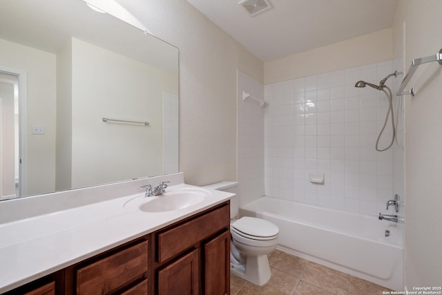 bathroom with visible vents, toilet, shower / bath combination, tile patterned floors, and vanity