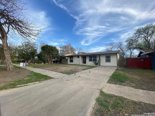 810 Weizmann St, San Antonio, TX 78213 - view of front of house with concrete driveway and fence