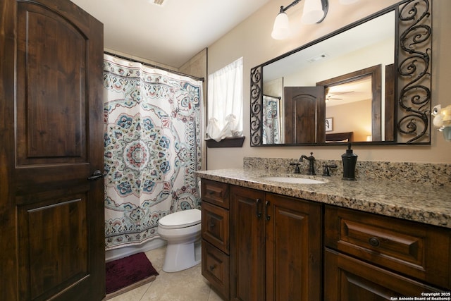 full bathroom featuring visible vents, toilet, curtained shower, tile patterned flooring, and vanity