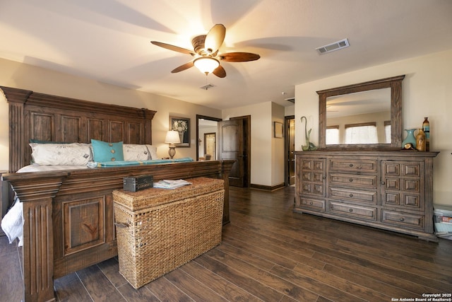 bedroom with visible vents, ceiling fan, baseboards, and dark wood-style flooring