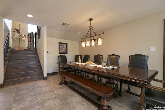 dining area with visible vents, recessed lighting, light tile patterned floors, baseboards, and stairs