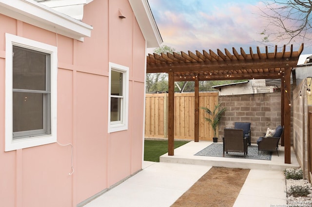 view of patio / terrace with fence and a pergola