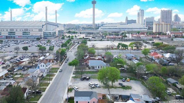 birds eye view of property with a city view