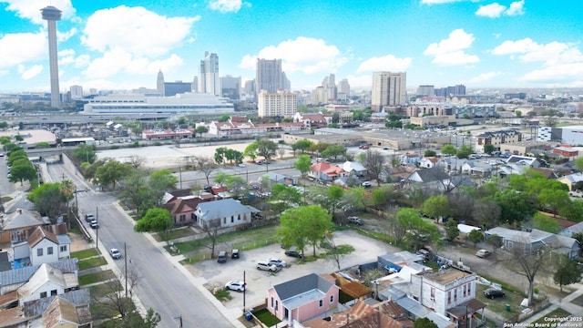 birds eye view of property featuring a view of city