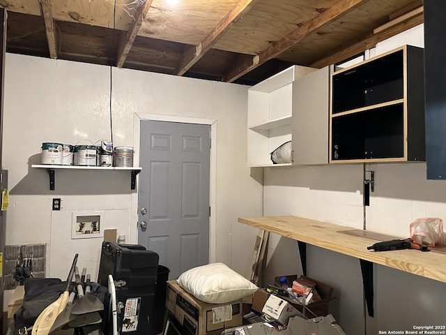 kitchen with open shelves and butcher block countertops