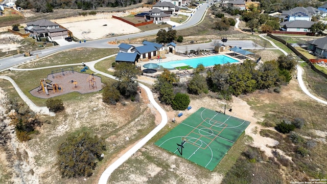 birds eye view of property with a residential view