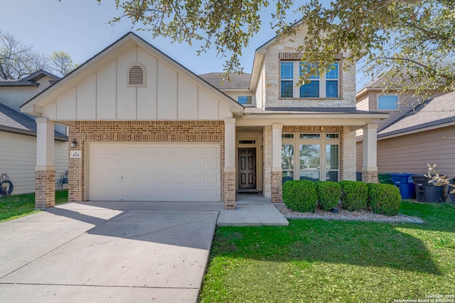 view of front of property featuring brick siding, board and batten siding, a front yard, driveway, and an attached garage