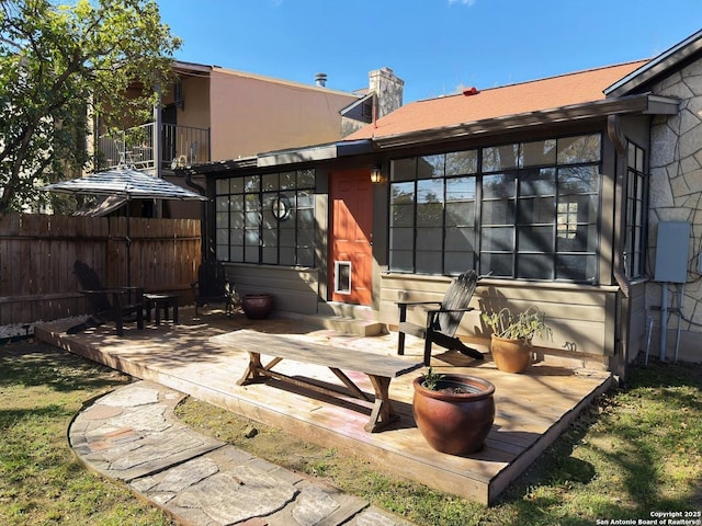 view of patio / terrace featuring fence