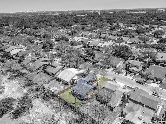 birds eye view of property with a residential view