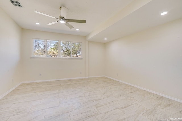 spare room featuring visible vents, recessed lighting, baseboards, and a ceiling fan