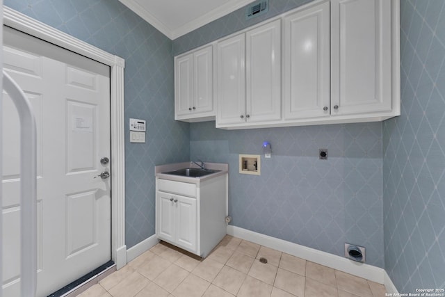 laundry room featuring hookup for a washing machine, cabinet space, a sink, electric dryer hookup, and crown molding