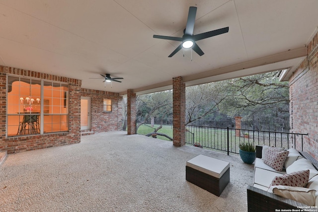 view of patio / terrace featuring outdoor lounge area, a ceiling fan, and fence