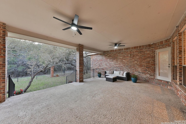 view of patio / terrace featuring an outdoor hangout area, a ceiling fan, and fence