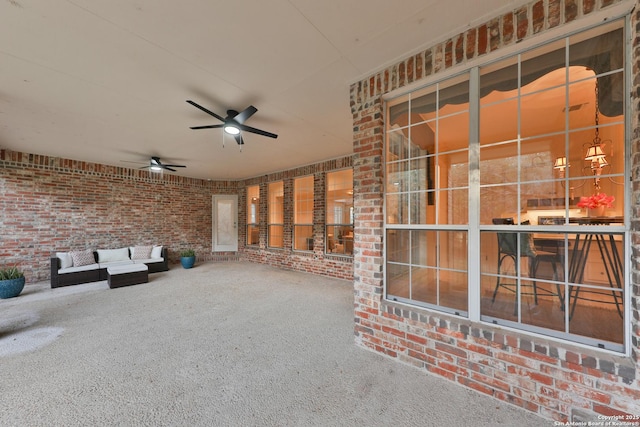 view of patio / terrace with an outdoor living space and a ceiling fan