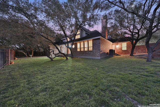 view of yard featuring cooling unit and a fenced backyard