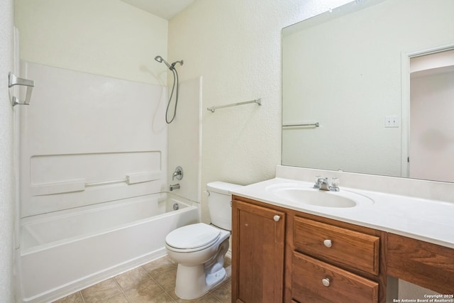 bathroom featuring vanity, tile patterned floors, toilet, and shower / bathtub combination