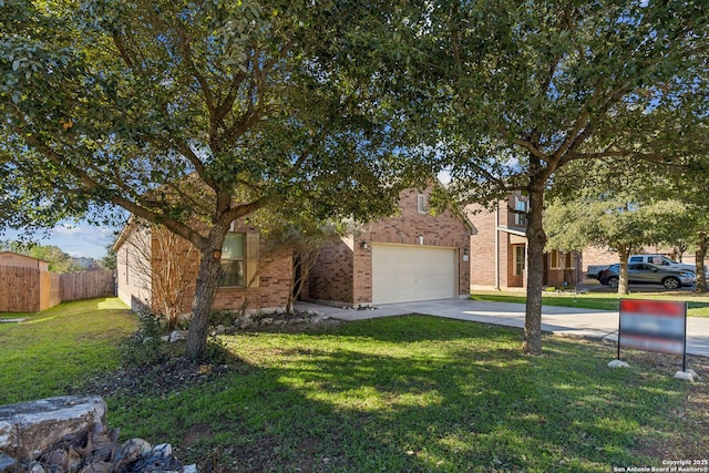 view of property hidden behind natural elements with brick siding, driveway, a front yard, and fence