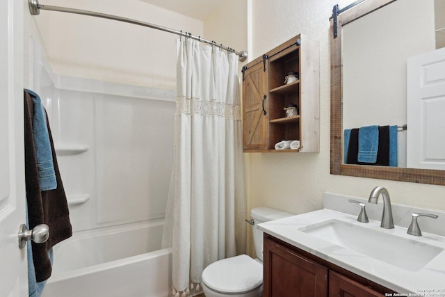 full bathroom with toilet, vanity, shower / tub combo, and a textured wall