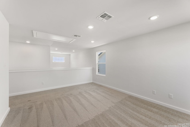 13223 Edith Gdns, San Antonio, TX 78253 - empty room featuring attic access, recessed lighting, carpet, and visible vents