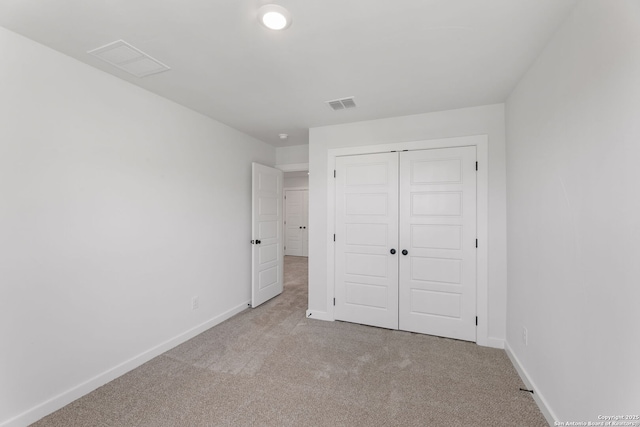 13223 Edith Gdns, San Antonio, TX 78253 - unfurnished bedroom with visible vents, baseboards, carpet, and a closet