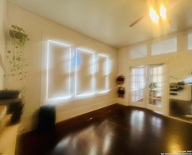 spare room with dark wood-type flooring