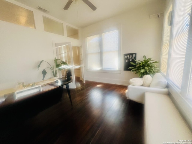 office with visible vents, ceiling fan, and wood finished floors